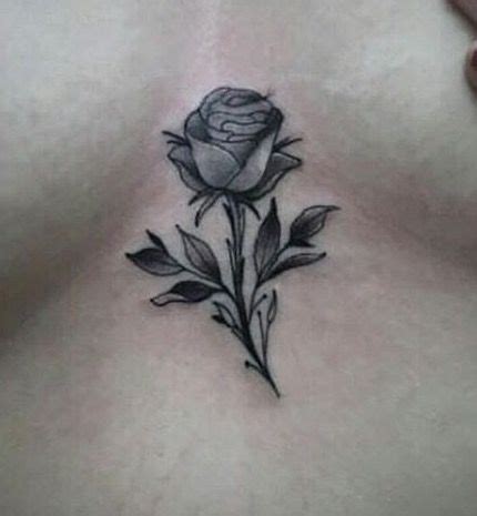 small rose tattoo between breast|30 Best Tattoo Between Breast Ideas You Should。